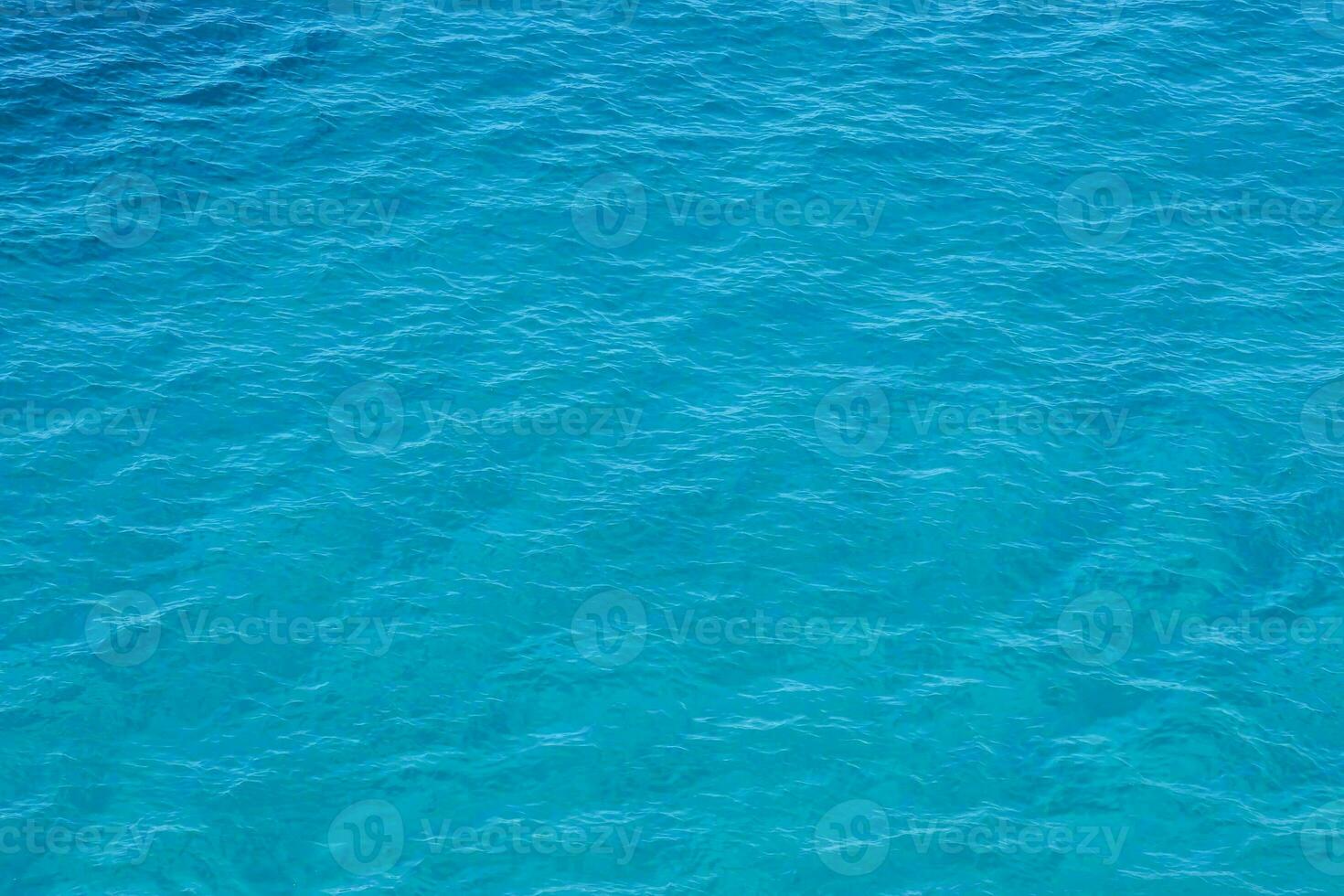 the ocean is blue and clear photo