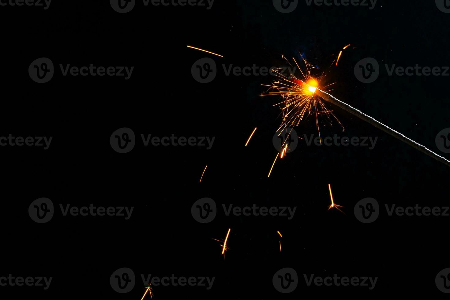 closeup view of burning sparkler photo