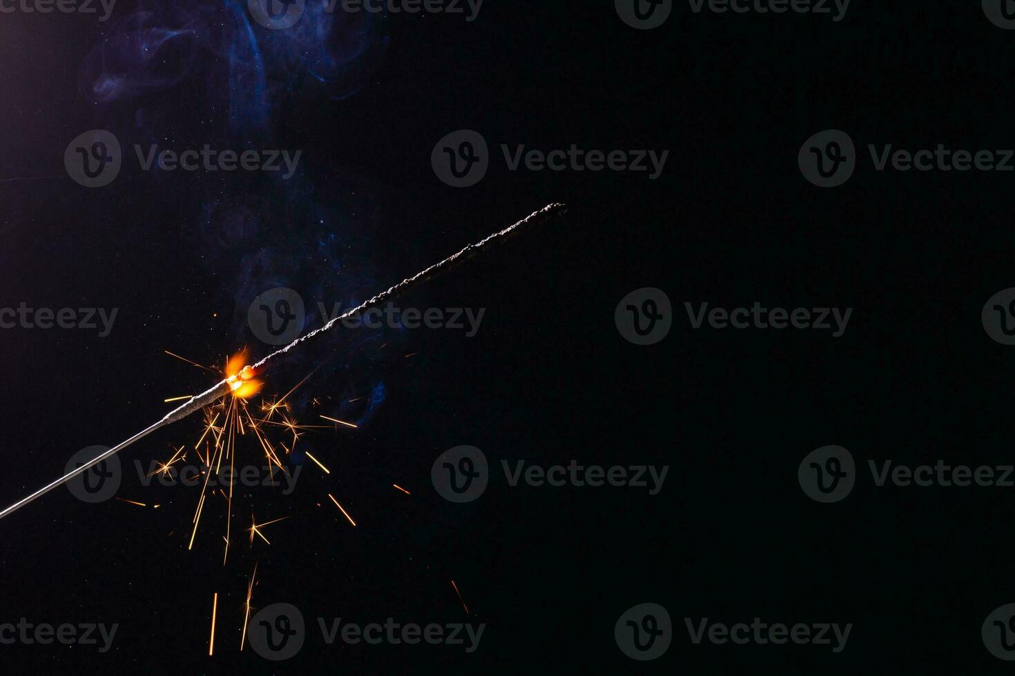 closeup view of burning sparkler photo