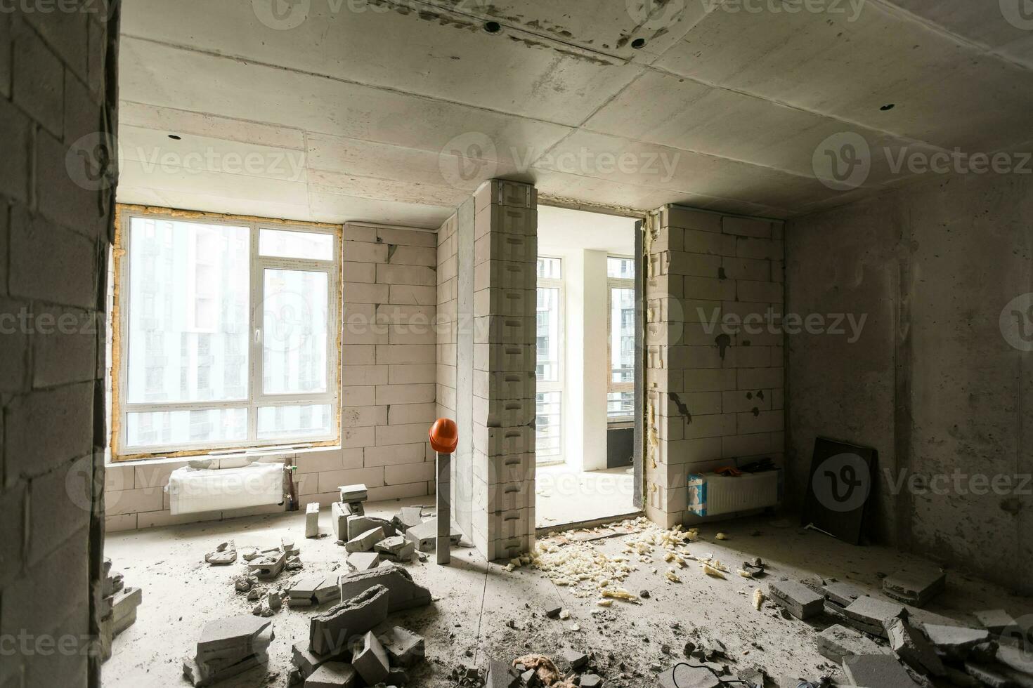 Abandoned house interior, dirty room, rotten peeled walls. photo