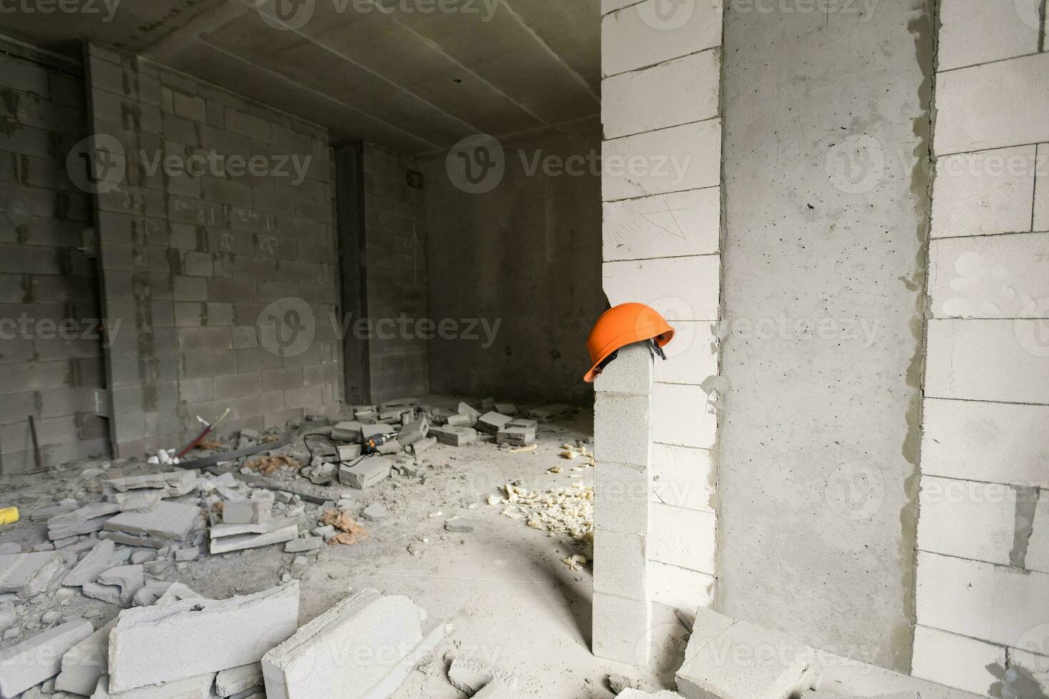 Abandoned house interior, dirty room, rotten peeled walls. photo