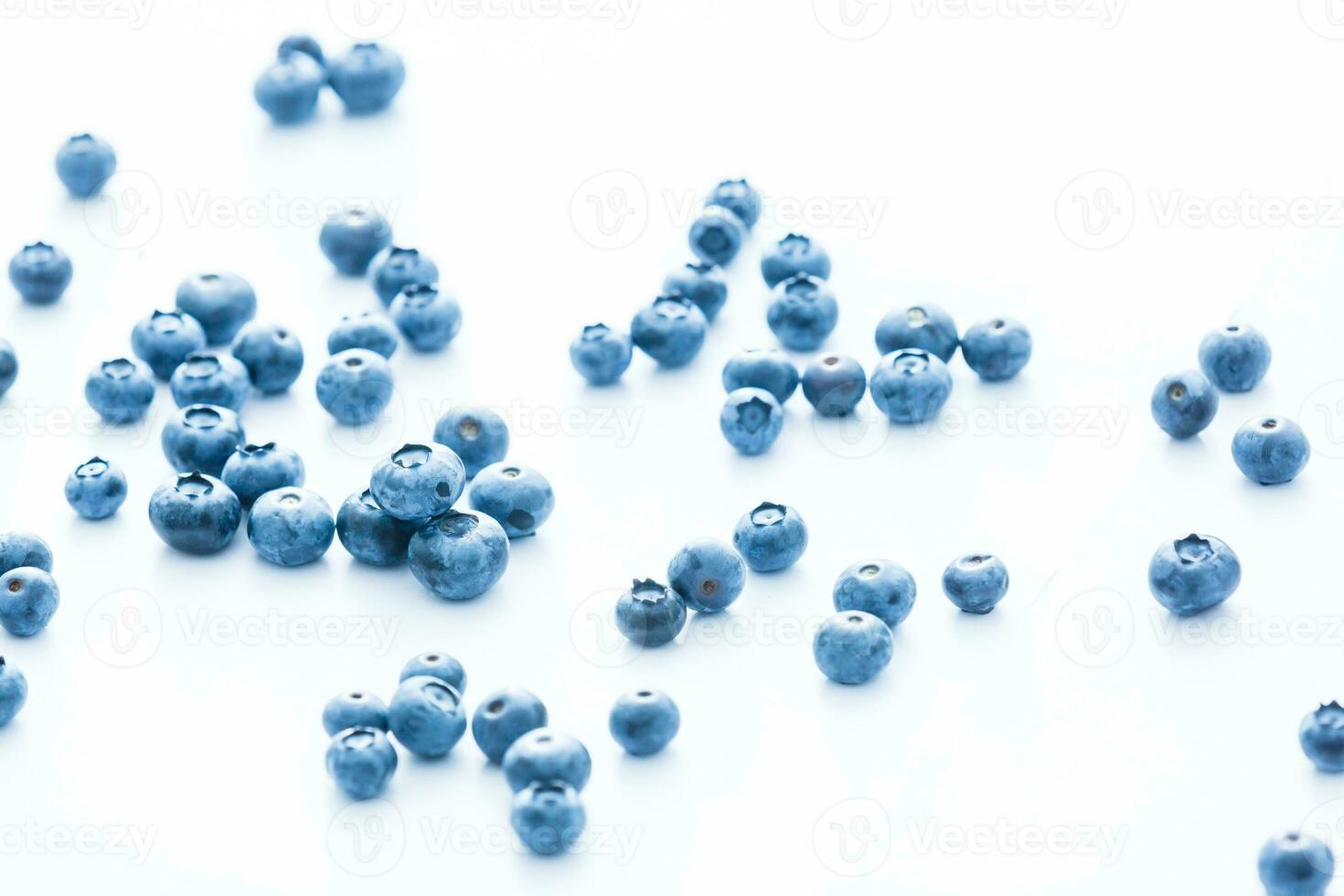 Tasty blueberries isolated on white background. Blueberries are antioxidant organic superfood. photo