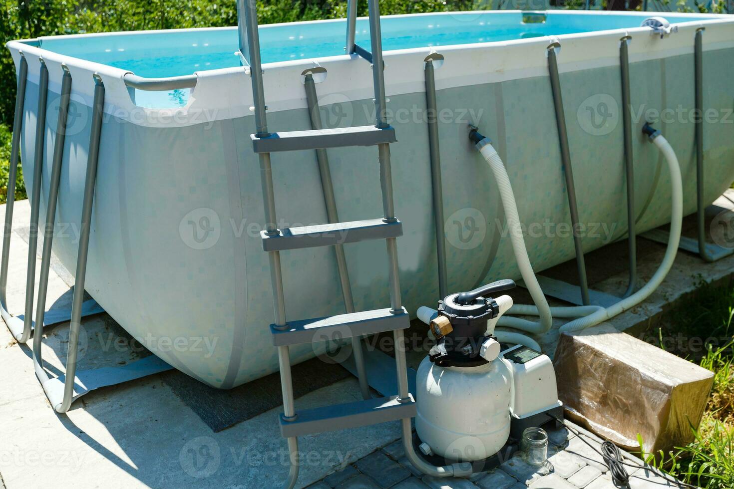 frame pool in the garden of a private house, summer photo