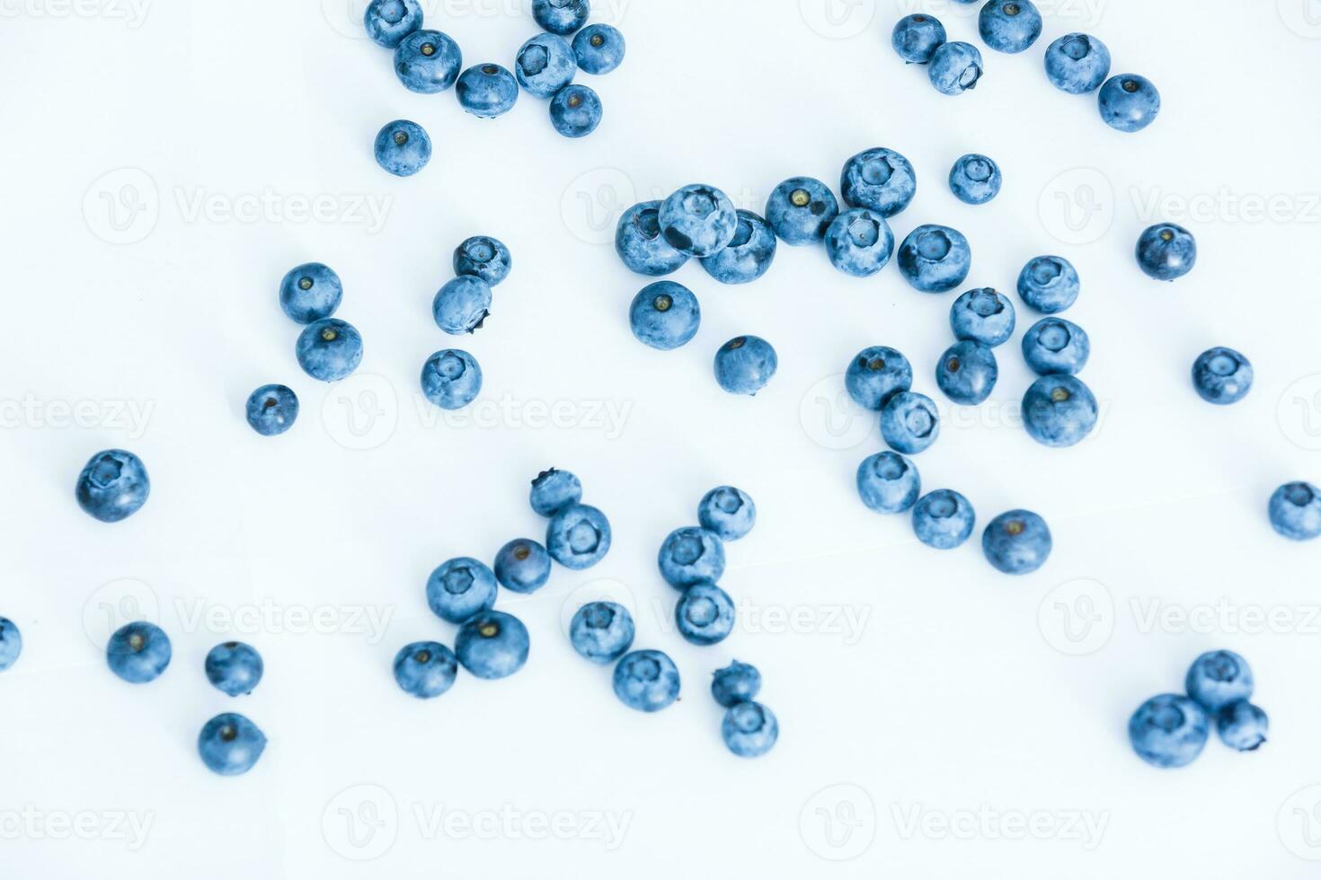 Tasty blueberries isolated on white background. Blueberries are antioxidant organic superfood. photo