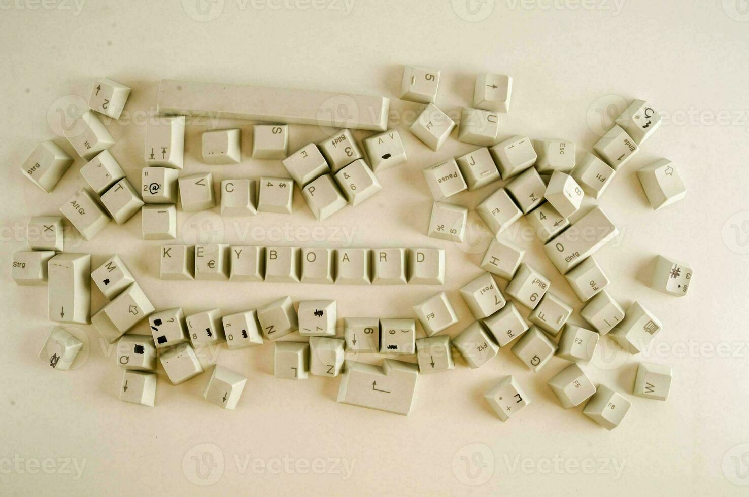 a pile of computer keyboards photo
