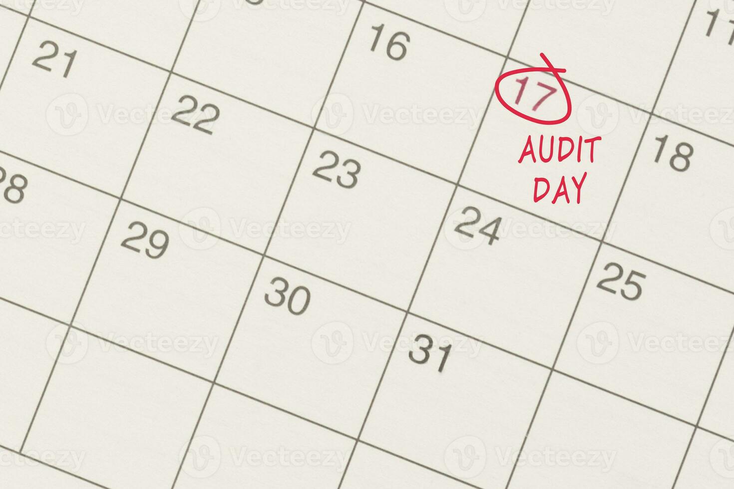 Red circle mark on the calendar at 17 for reminder of Audit Day. photo