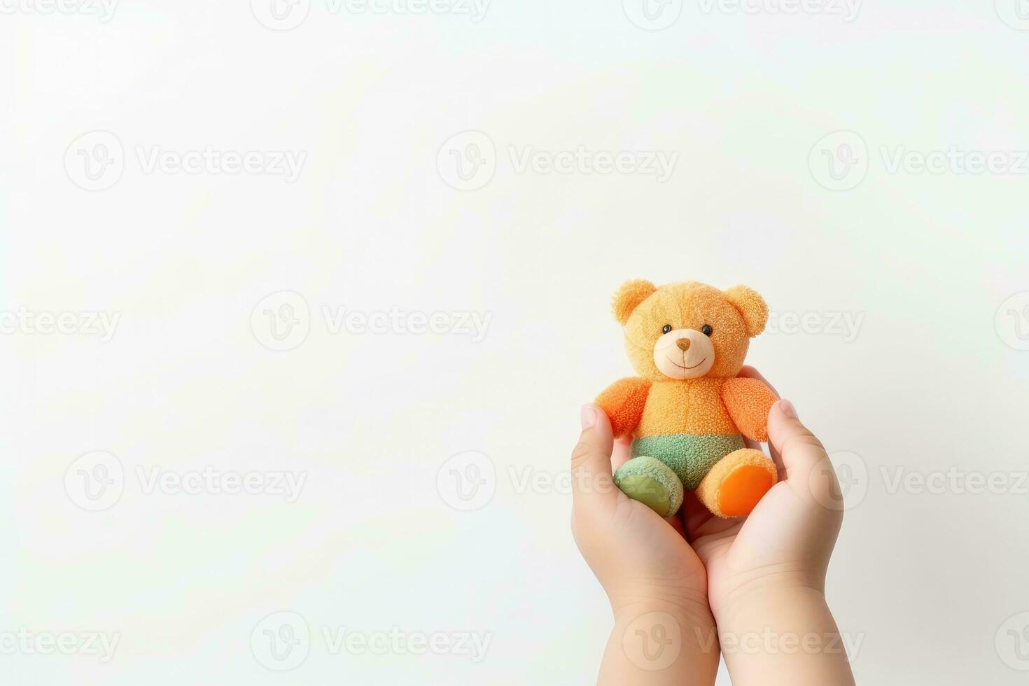 AI generated Child hands holding smiling cute little teddy bear on white background with copy space. photo