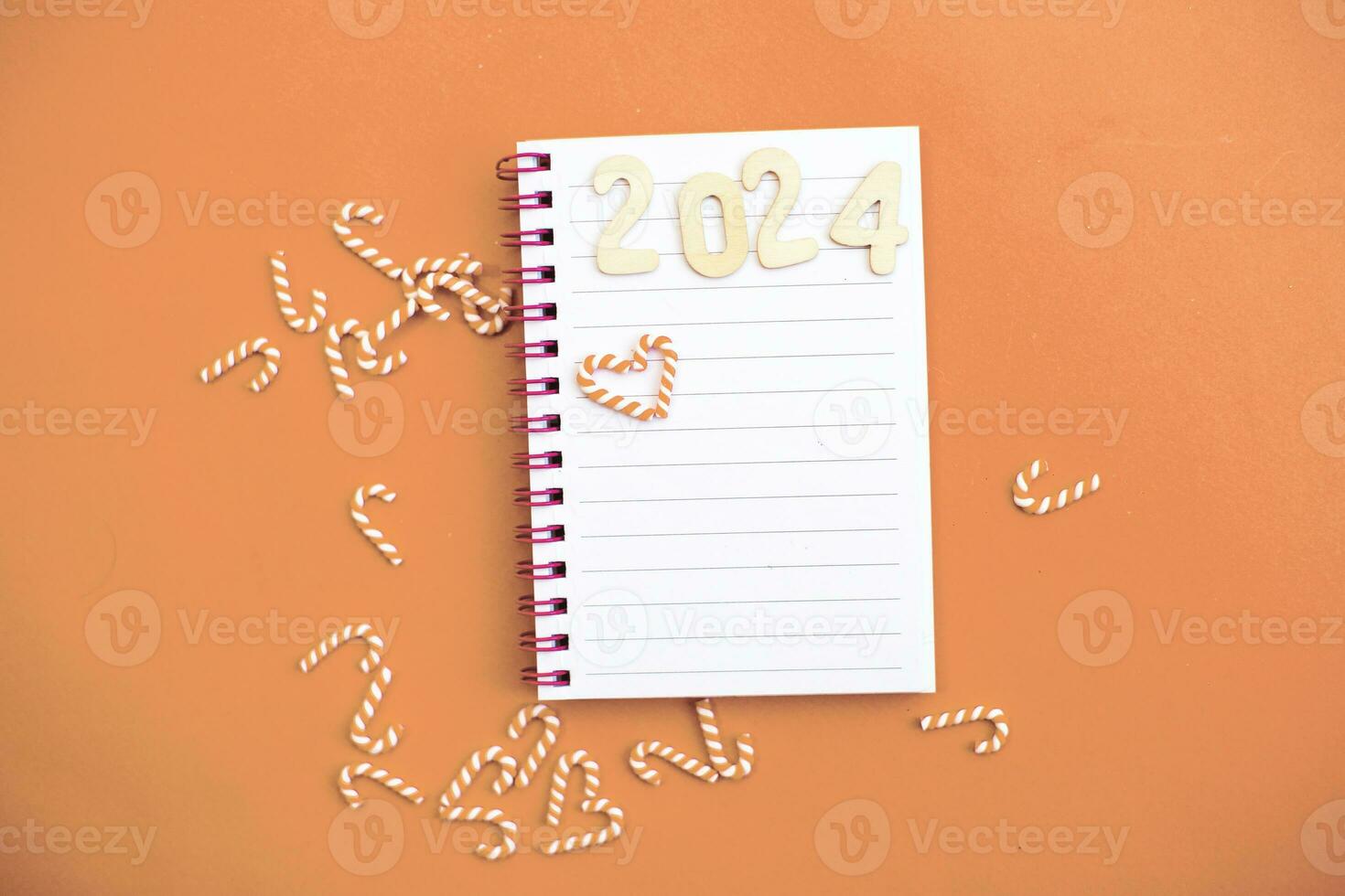 Top view of white paper blank notebook for writing wish list. photo