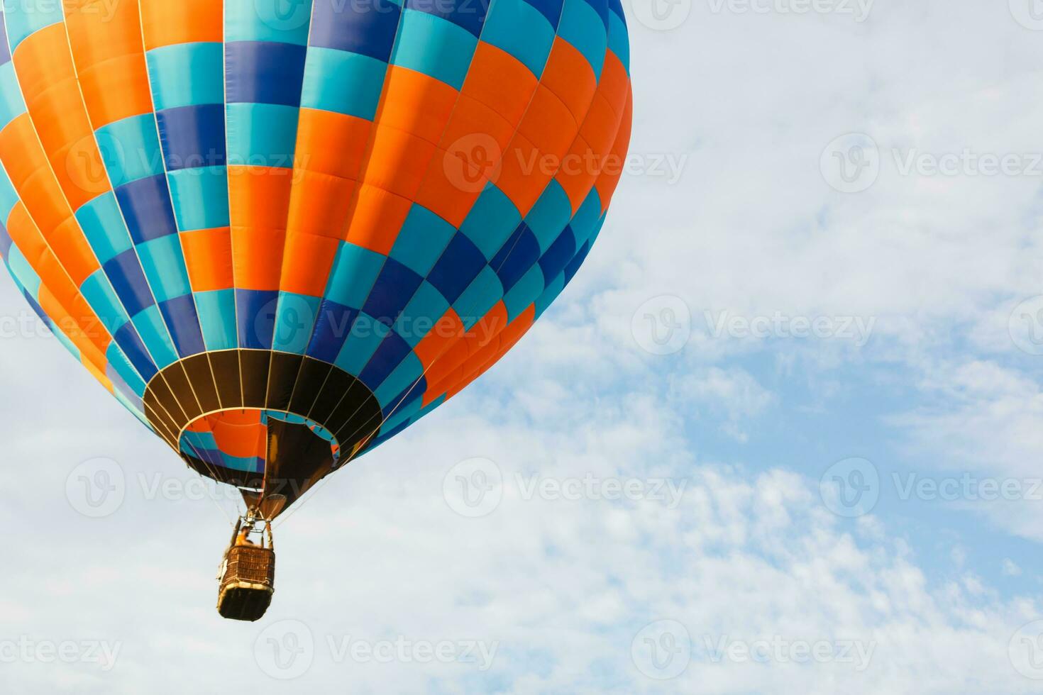 hot air balloon over blue sky. Composition of nature and blue sky background photo