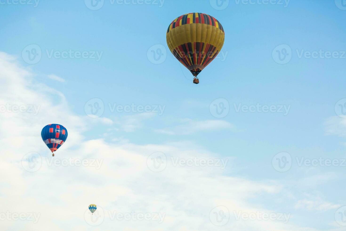 hot air balloon over blue sky. Composition of nature and blue sky background photo