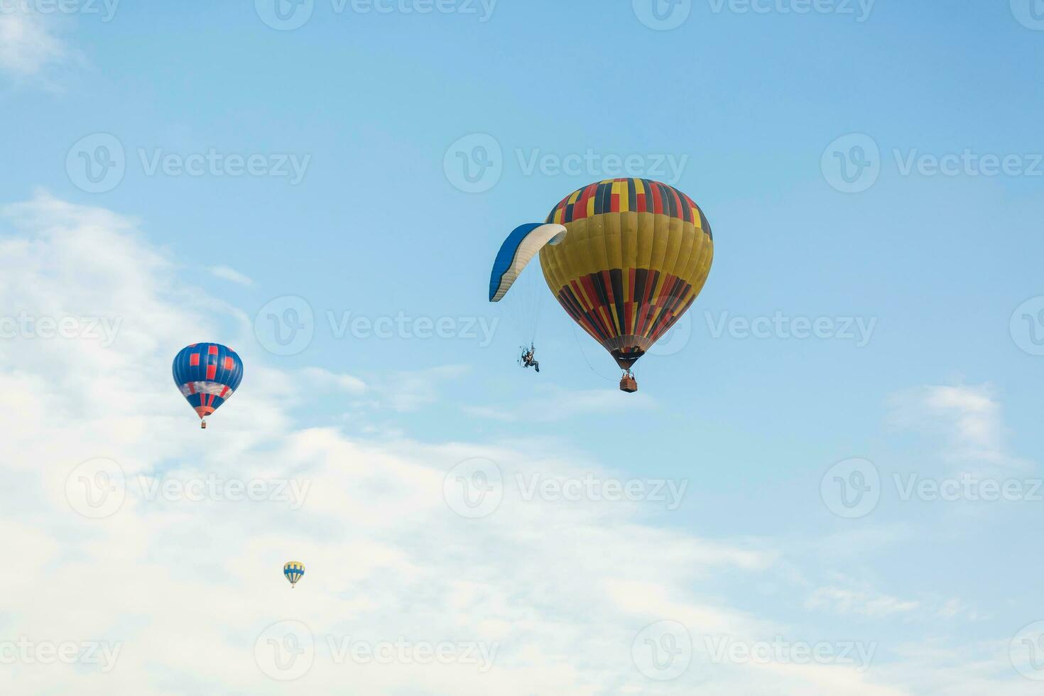 hot air balloon over blue sky. Composition of nature and blue sky background photo