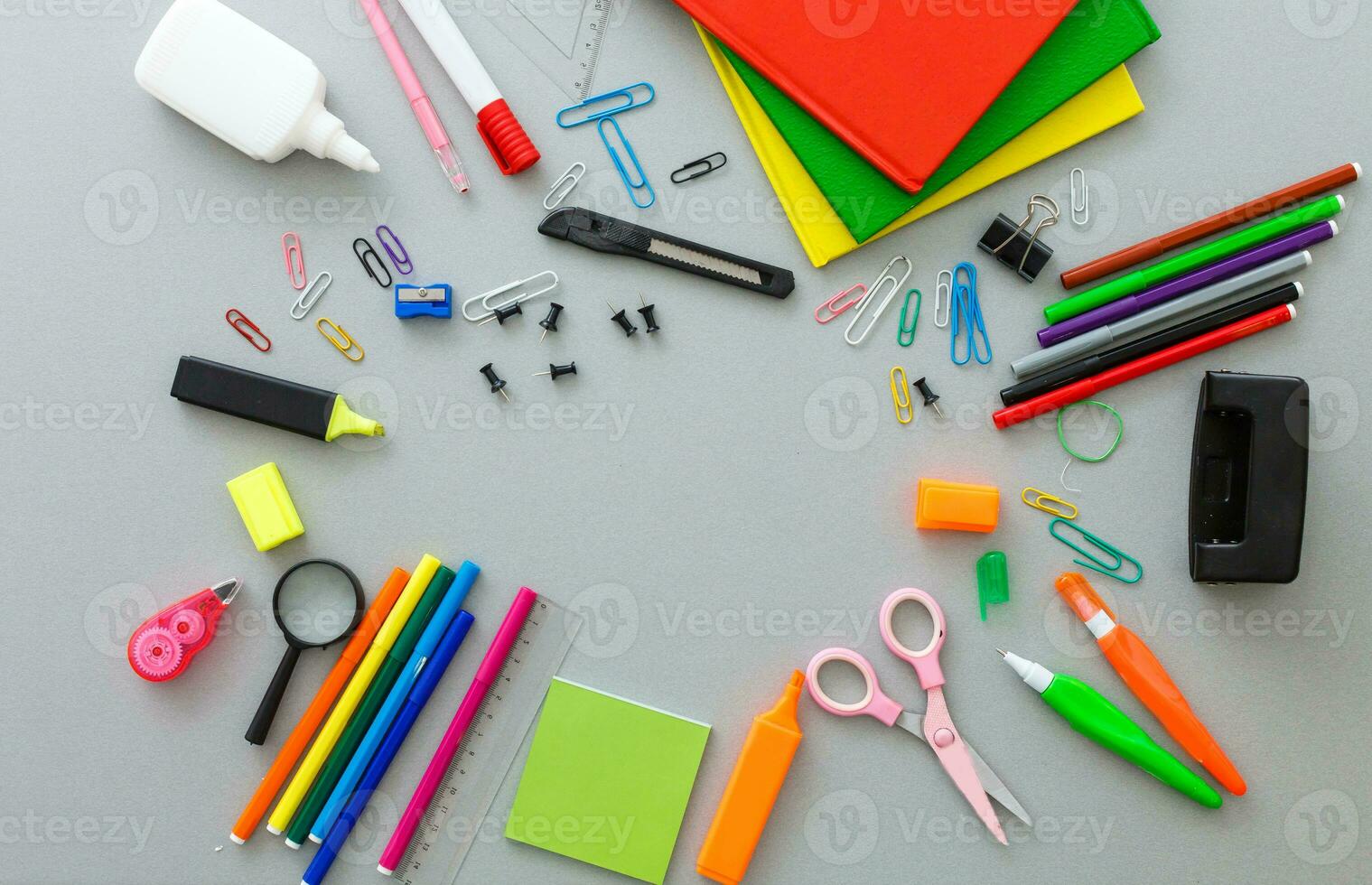 Photo of office and student gear over white background - Back to school concept