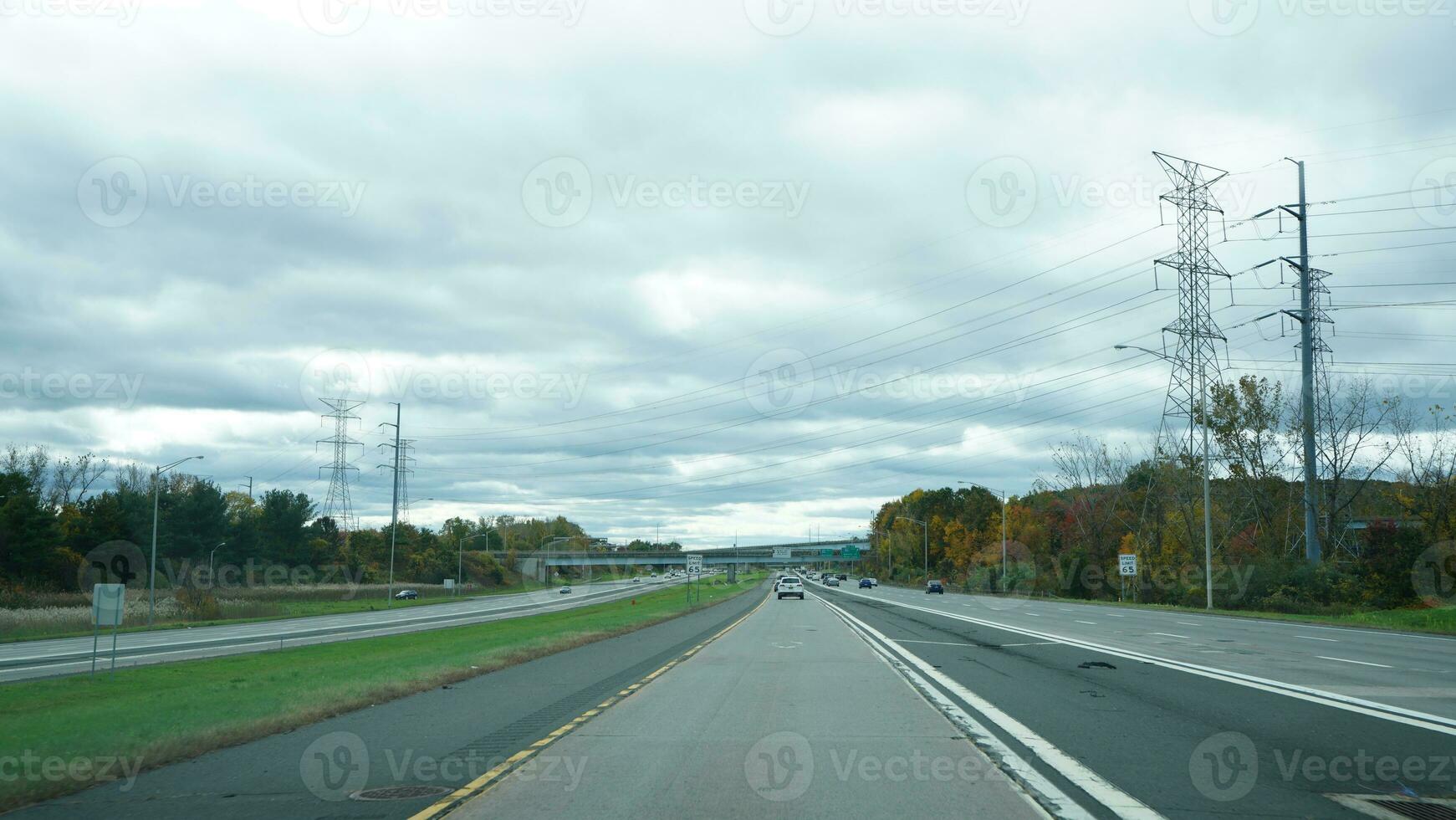 The highway landscape with side view and cloudy sky as background photo