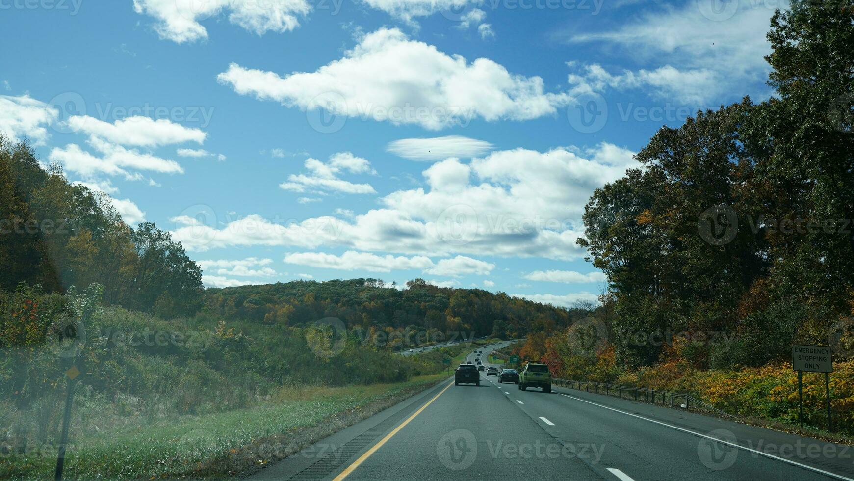 The highway landscape with side view and cloudy sky as background photo