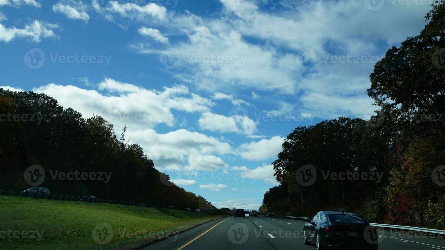 The highway landscape with side view and cloudy sky as background photo