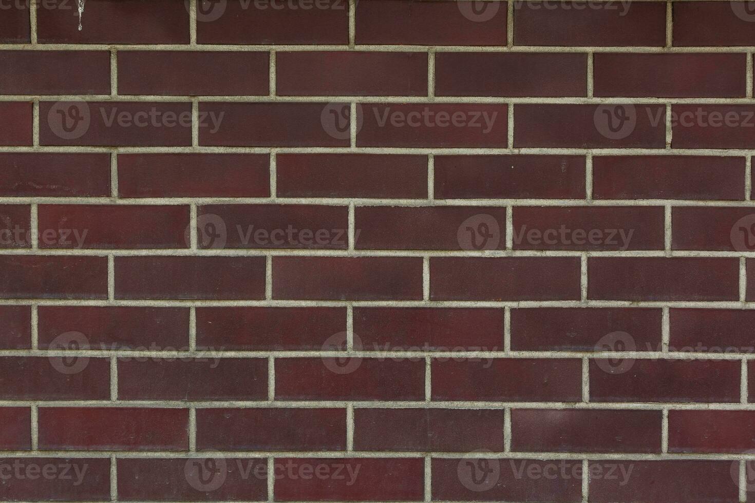 red brick wall texture grunge background with vignetted corners, may use to interior design photo