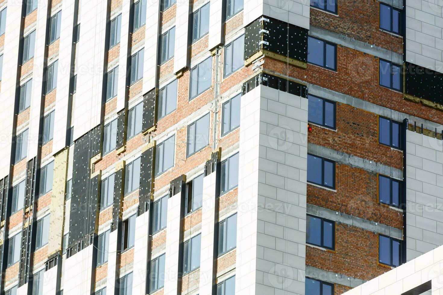 Building facade renovation, house reconstruction, repair. photo