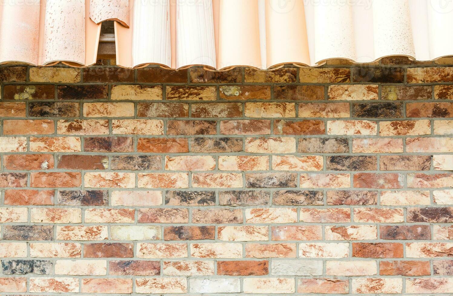 red brick wall house roof details closeup photo