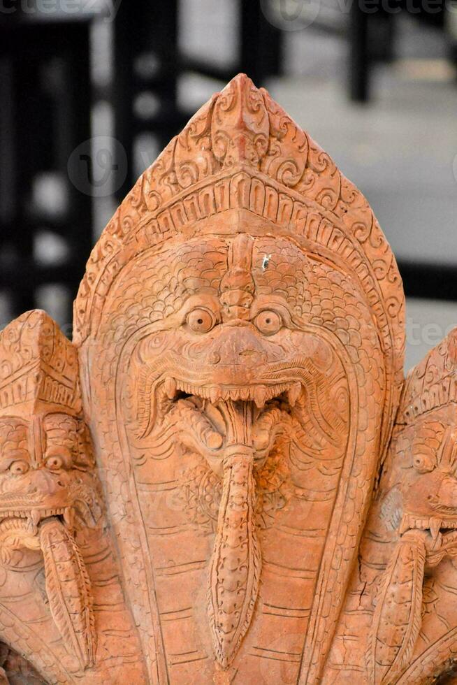 Detail of Buddhist temple sculpture photo