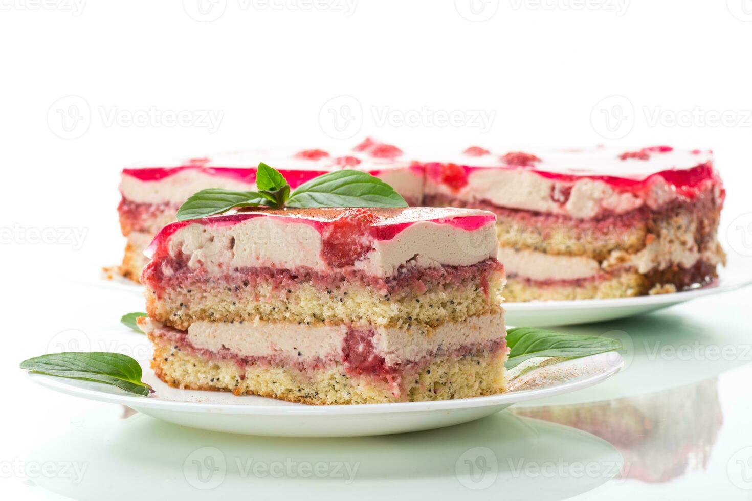 strawberry poppy cake with cream in a plate photo