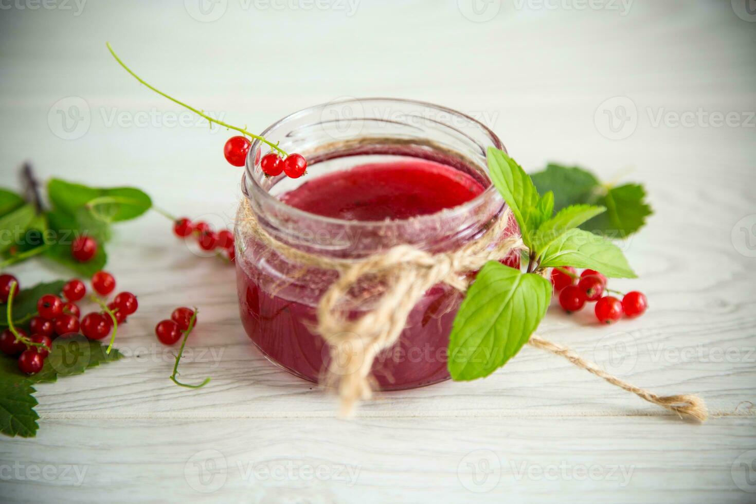 sweet summer jam from ripe red currants in a jar photo