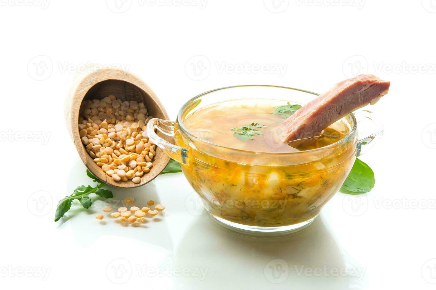 cooked smoked pea soup with ribs in a plate photo