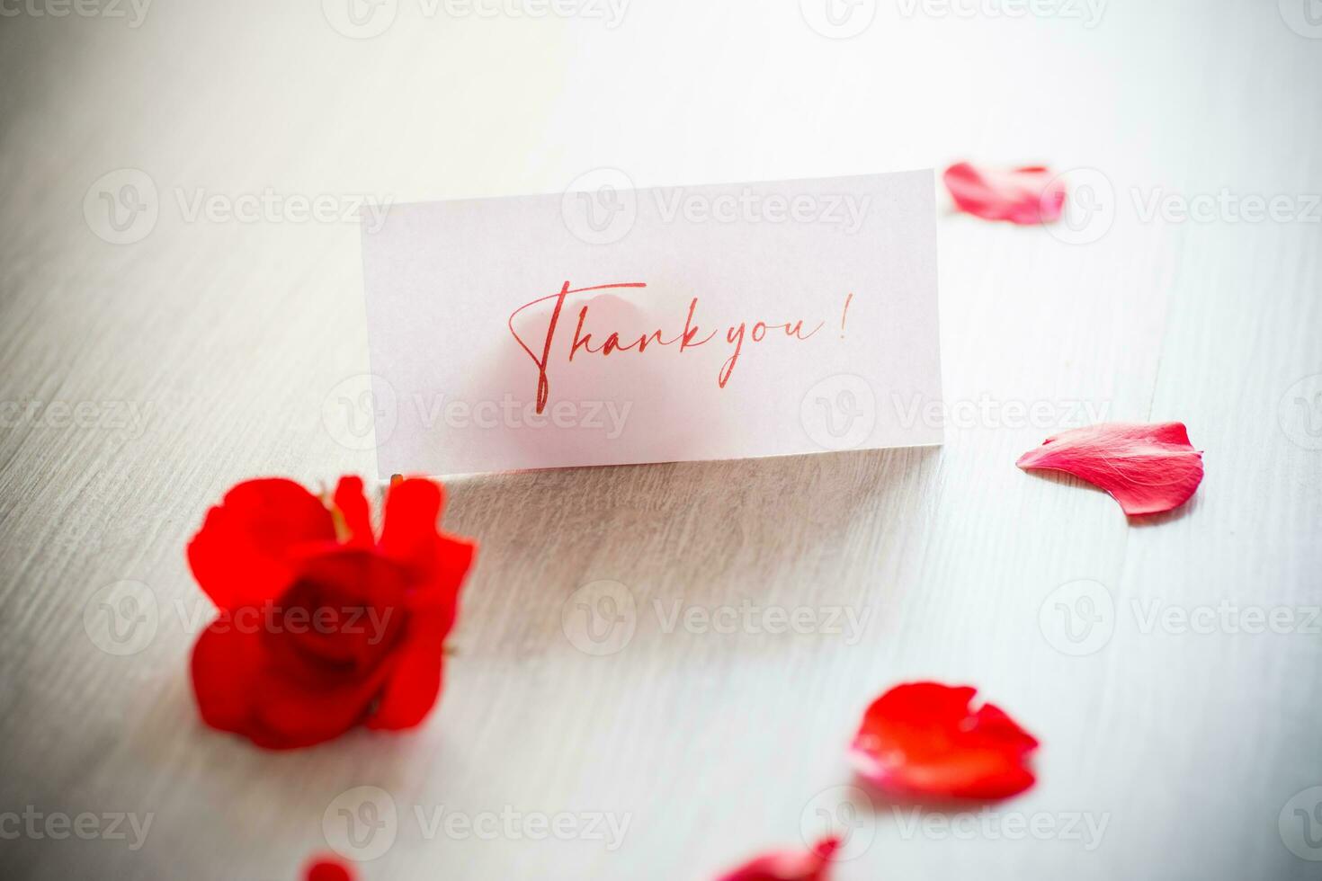 bouquet of beautiful red roses in a basket on table photo