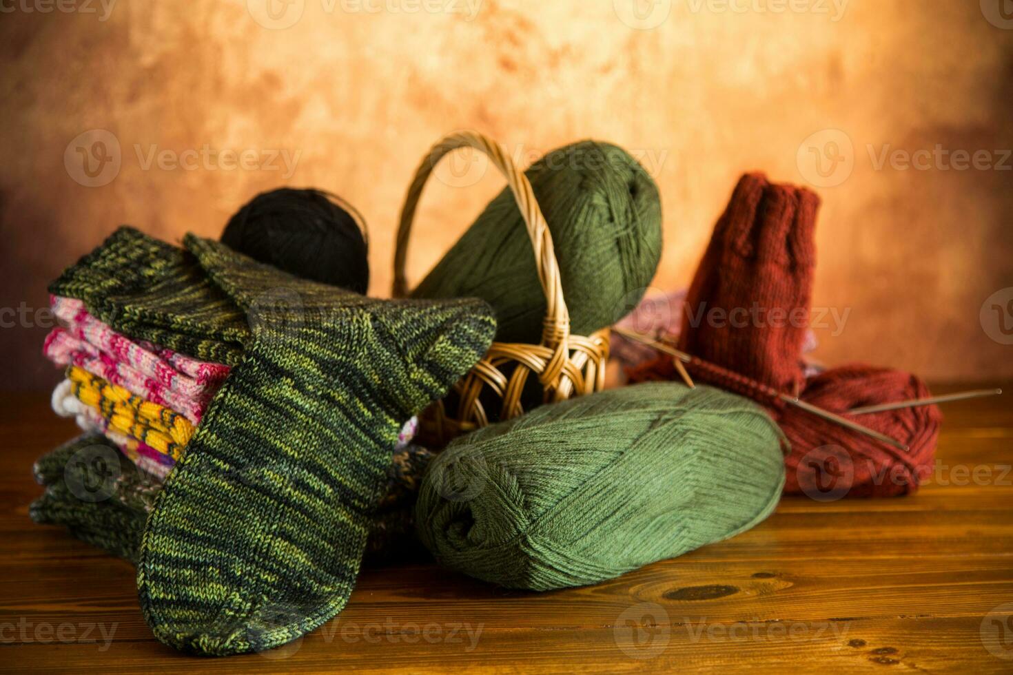 wool yarn, knitting needles and other tools for hand knitting. photo