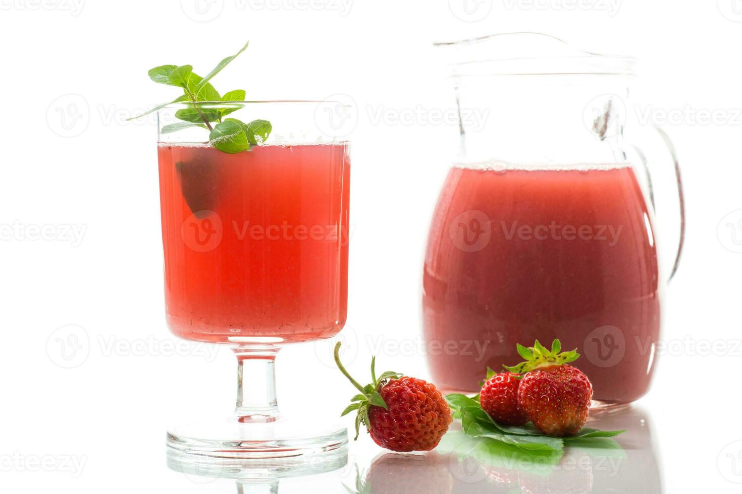 Cold summer strawberry kvass with mint in a glass photo