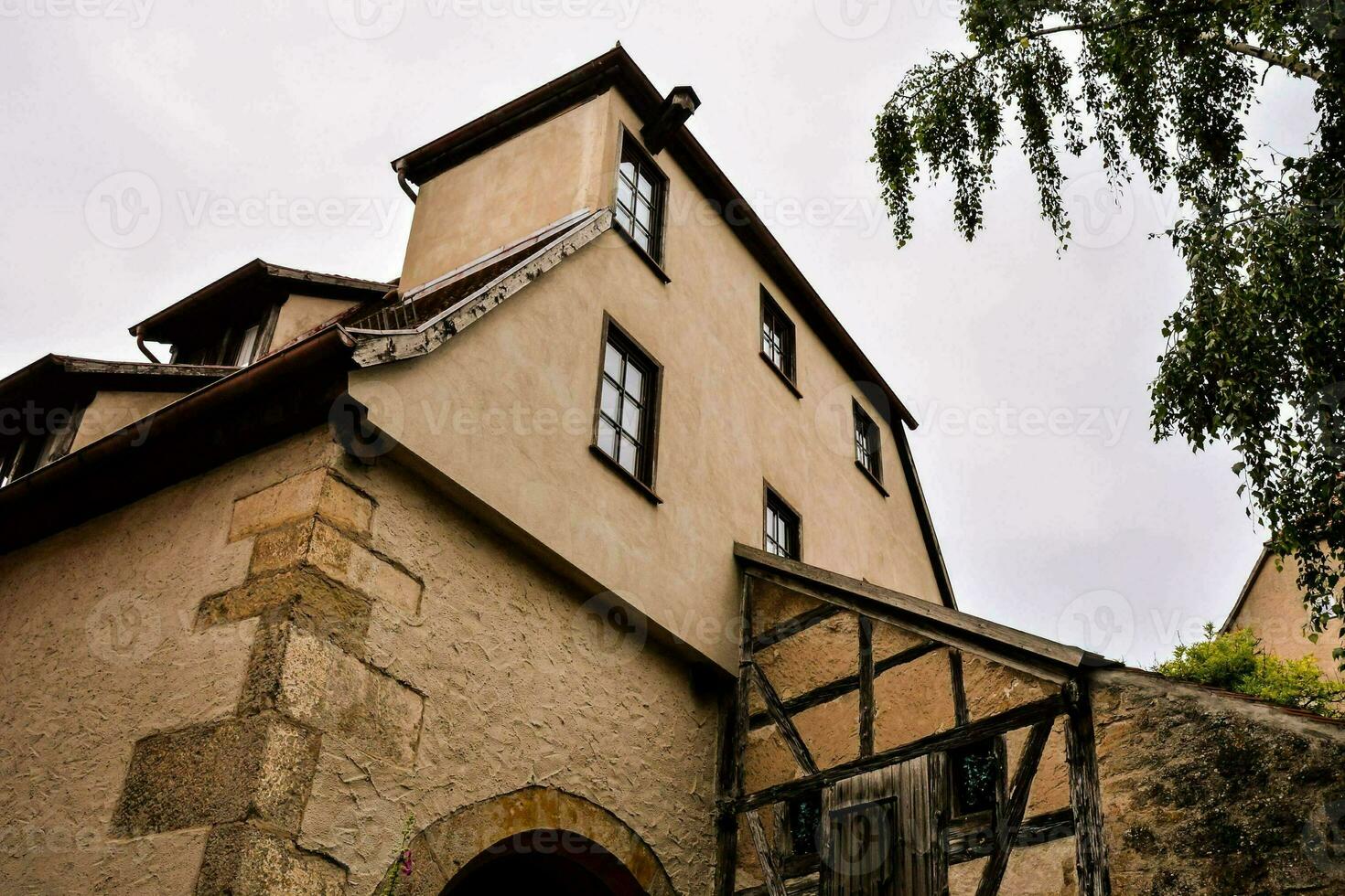 a historic building with a in the middle of a city photo