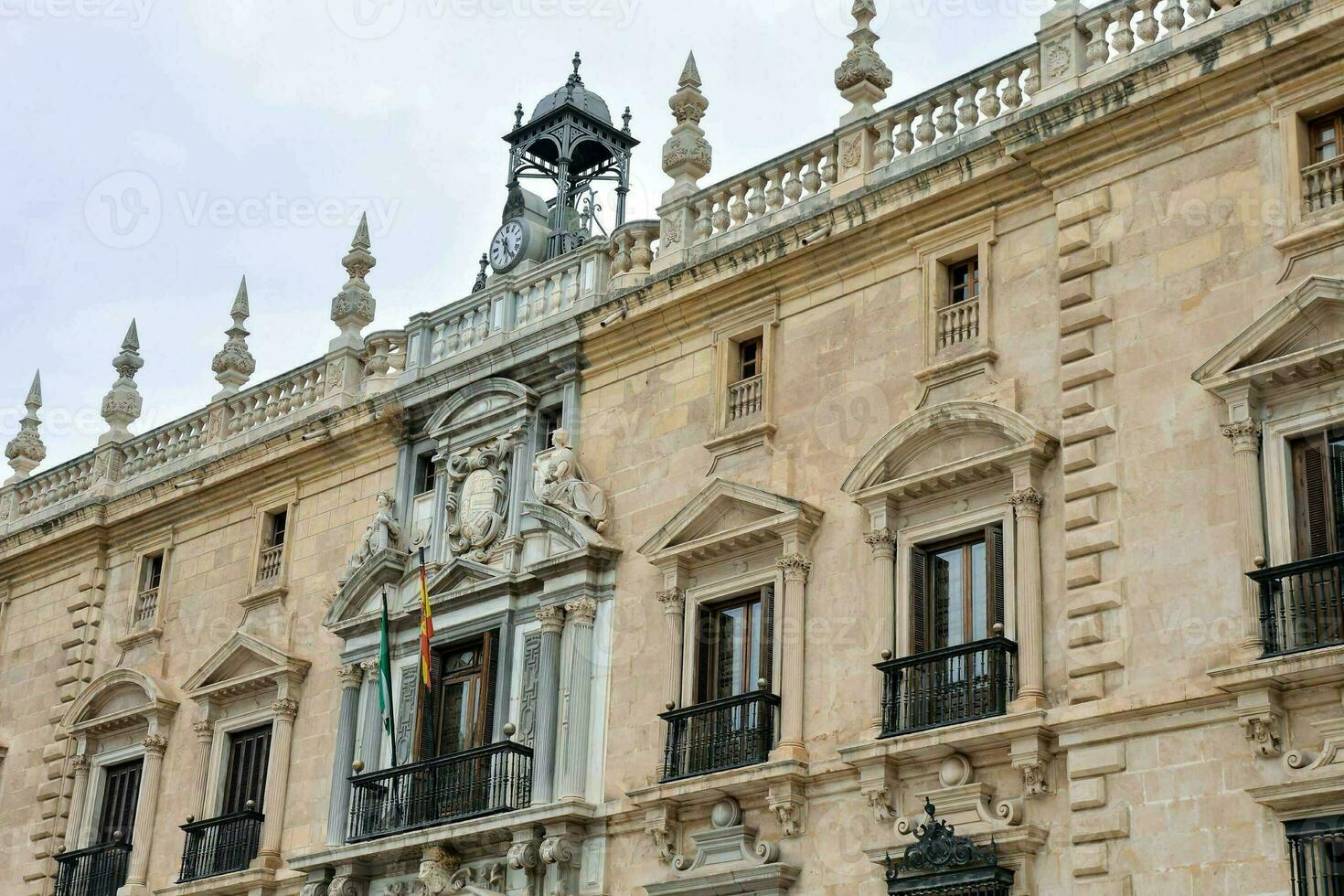 a historic building with a in the middle of a city photo