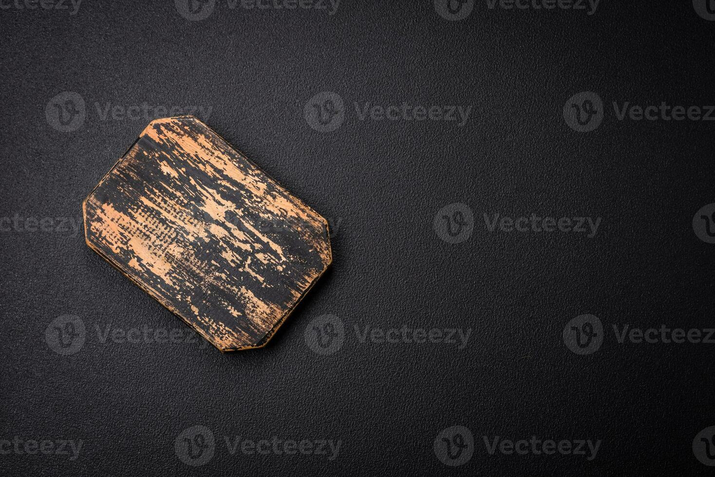 Empty wooden cutting board for preparing ingredients for preparing a delicious dish photo