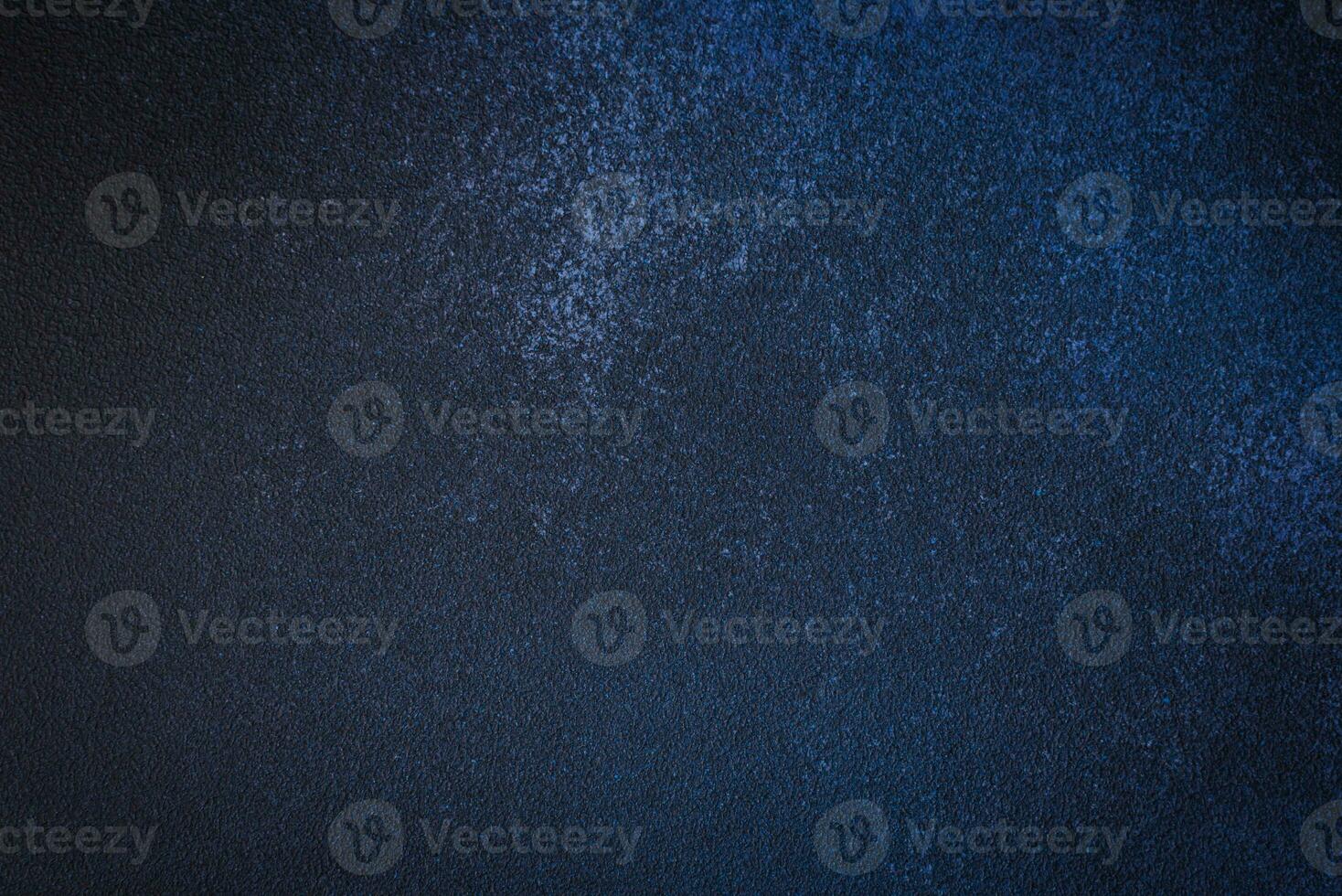 Texture of a concrete wall with cracks and scratches which can be used as a background photo