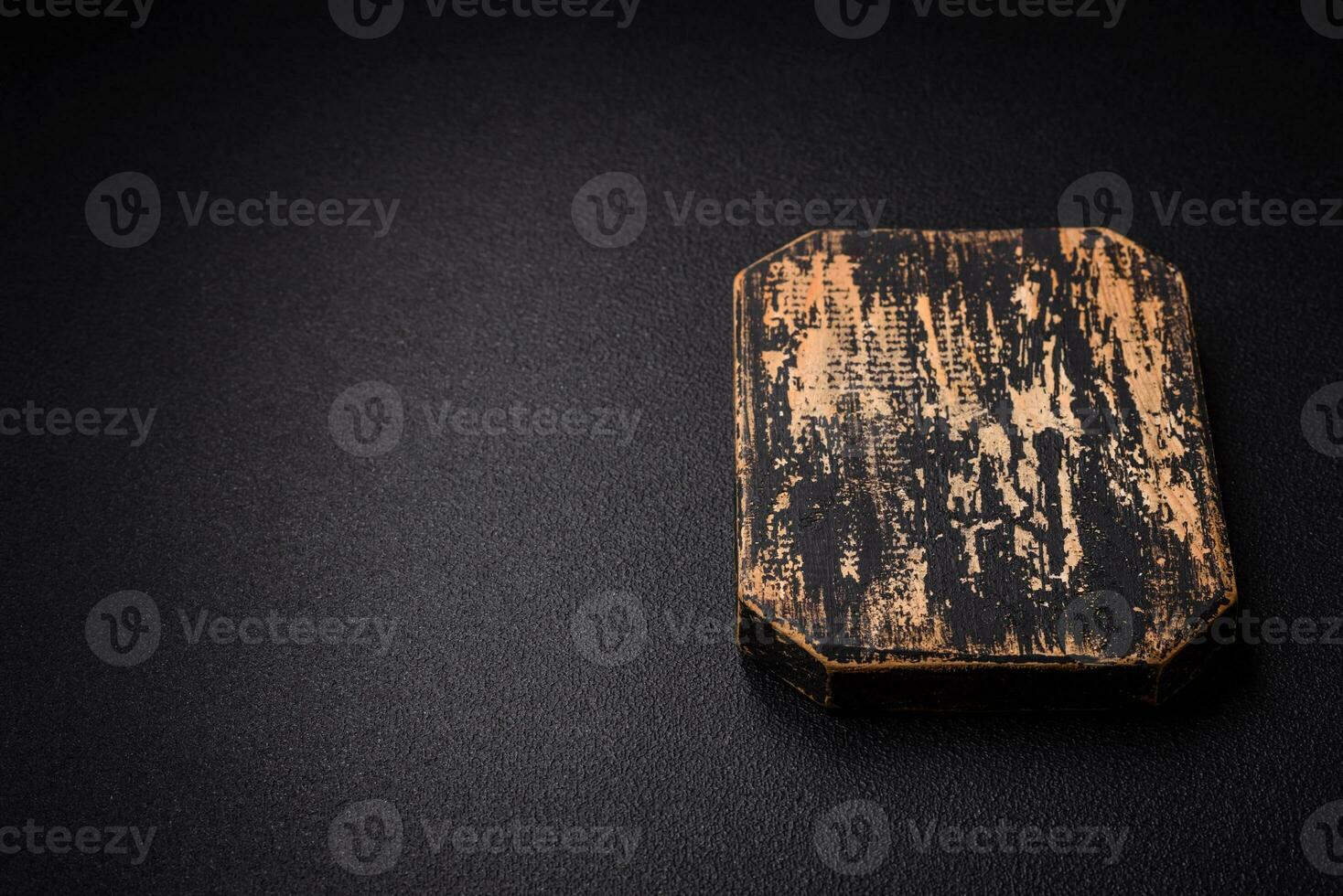 Empty wooden cutting board for preparing ingredients for preparing a delicious dish photo