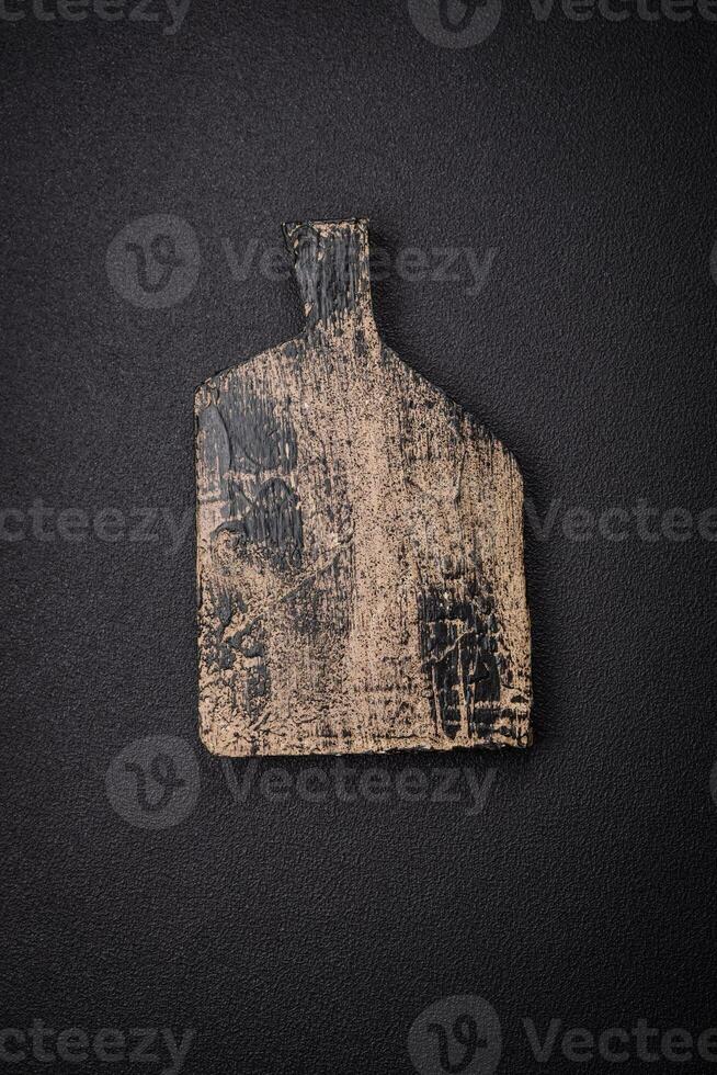 Empty wooden cutting board for preparing ingredients for preparing a delicious dish photo