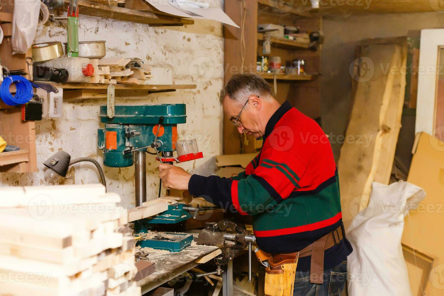 Image of mature carpenter in the workshop photo