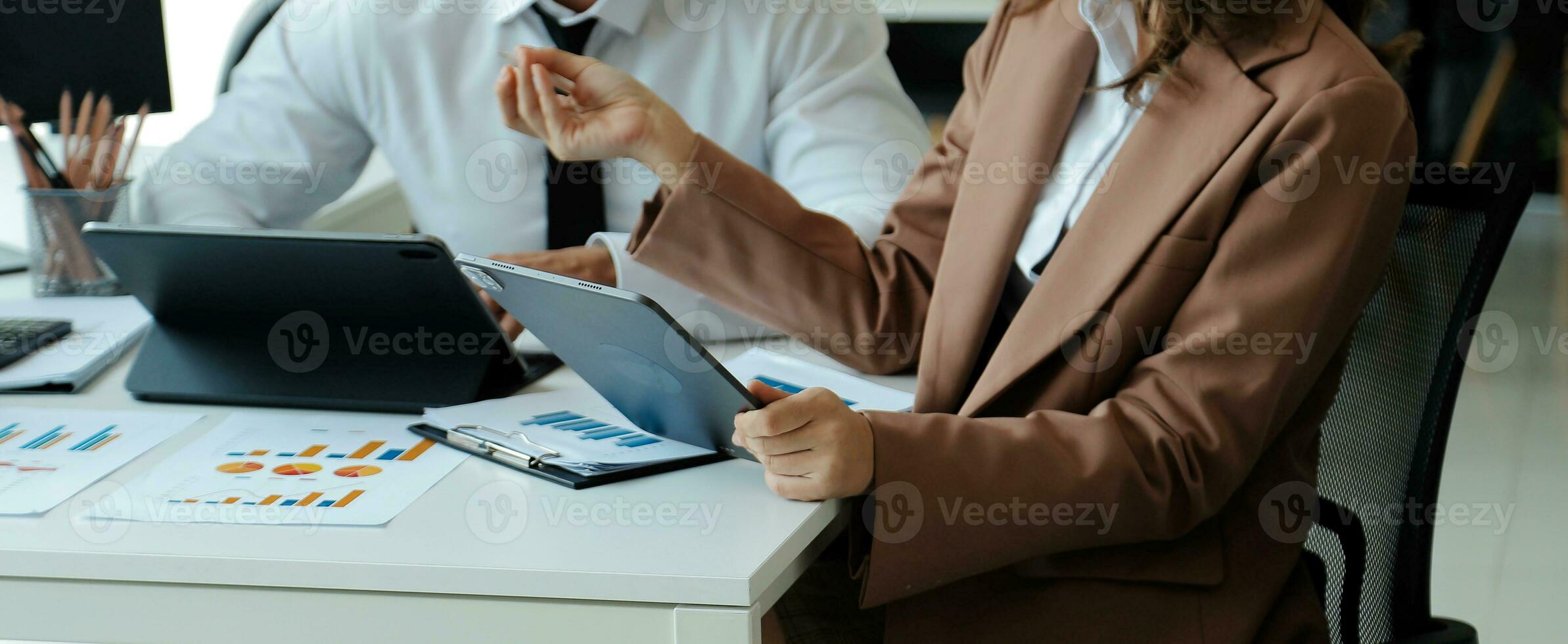 Team of business people working together in the meeting room office, teamwork background charts and graphs banner, double exposure successful teamwork,business planning concept. photo