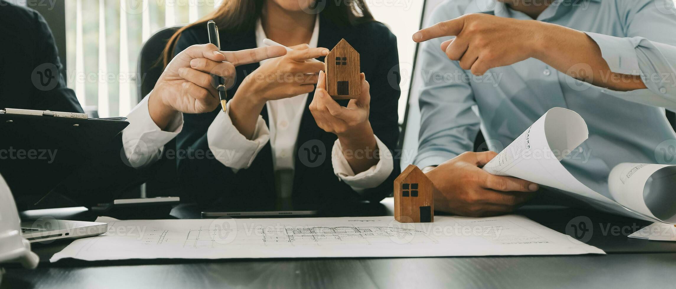 Construction and structure concept of Engineer or architect meeting for project working with partner and engineering tools on model building and blueprint in working site, contract for both companies. photo