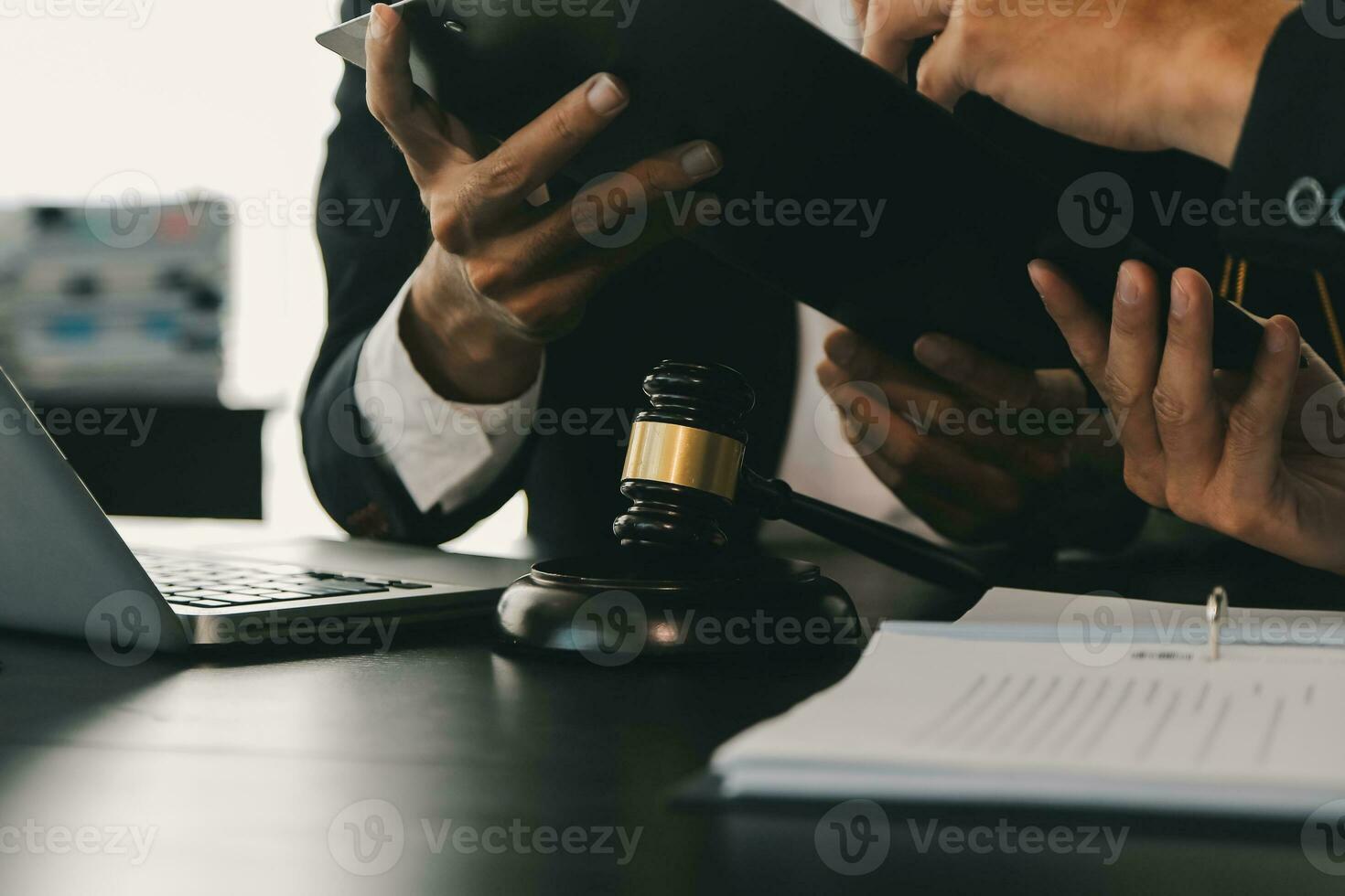 Consultation and conference of Male lawyers and professional businesswoman working and discussion having at law firm in office. Concepts of law, Judge gavel with scales of justice. photo