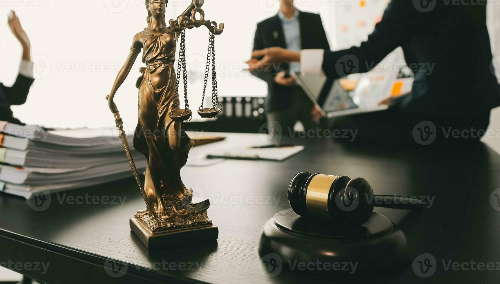 Consultation and conference of Male lawyers and professional businesswoman working and discussion having at law firm in office. Concepts of law, Judge gavel with scales of justice. photo