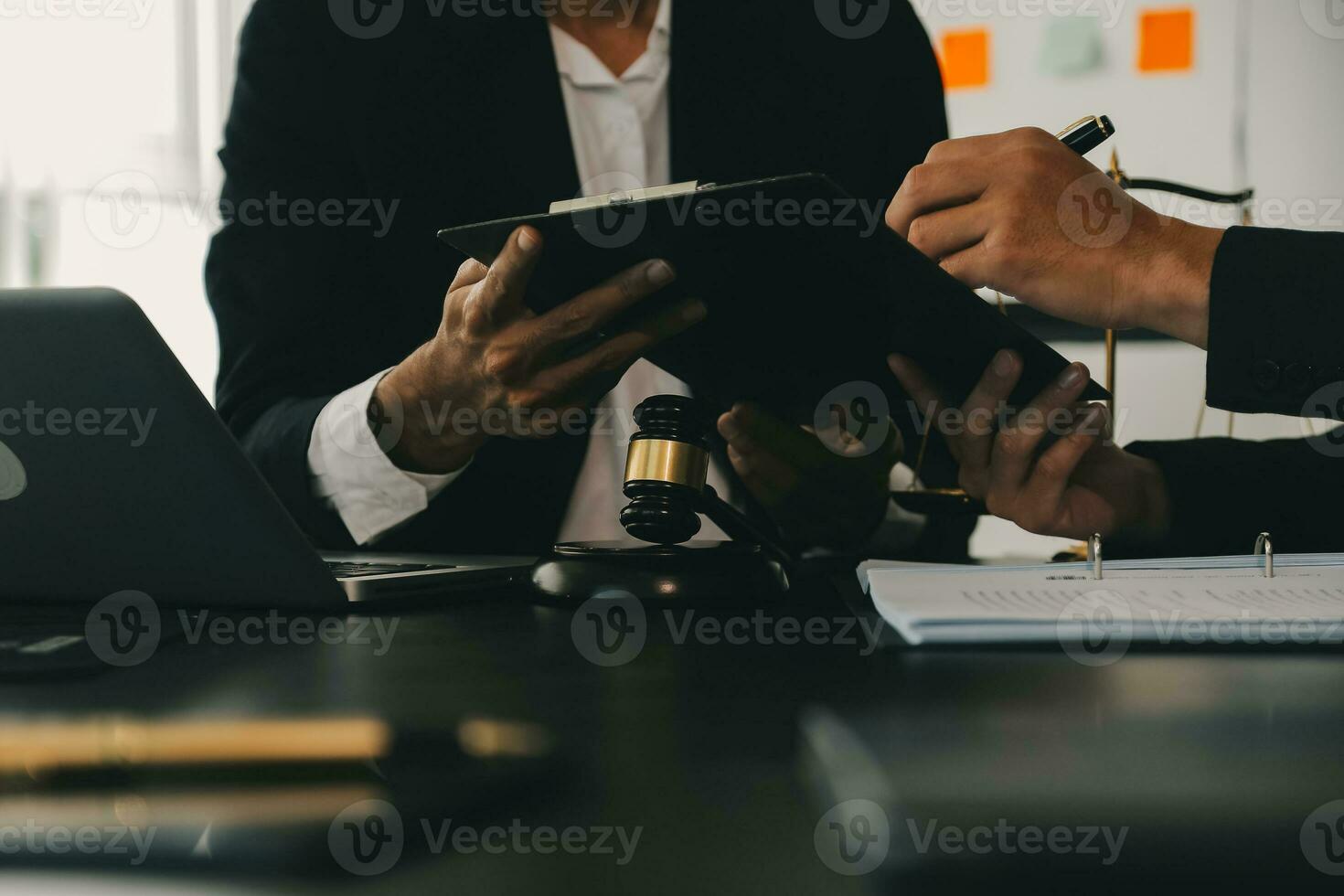 Consultation and conference of Male lawyers and professional businesswoman working and discussion having at law firm in office. Concepts of law, Judge gavel with scales of justice. photo