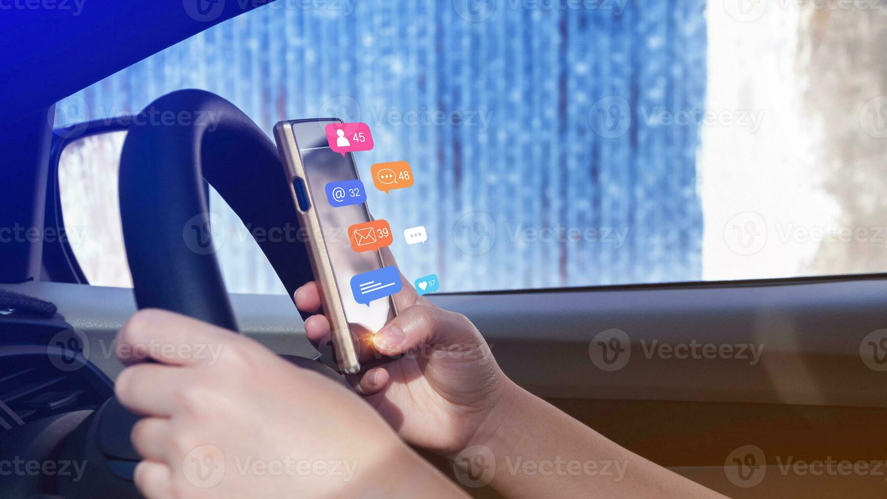 Woman using social media and digital online marketing concepts on mobile phones with icons such as notifications, messages, comments on the smartphone screen in car. photo