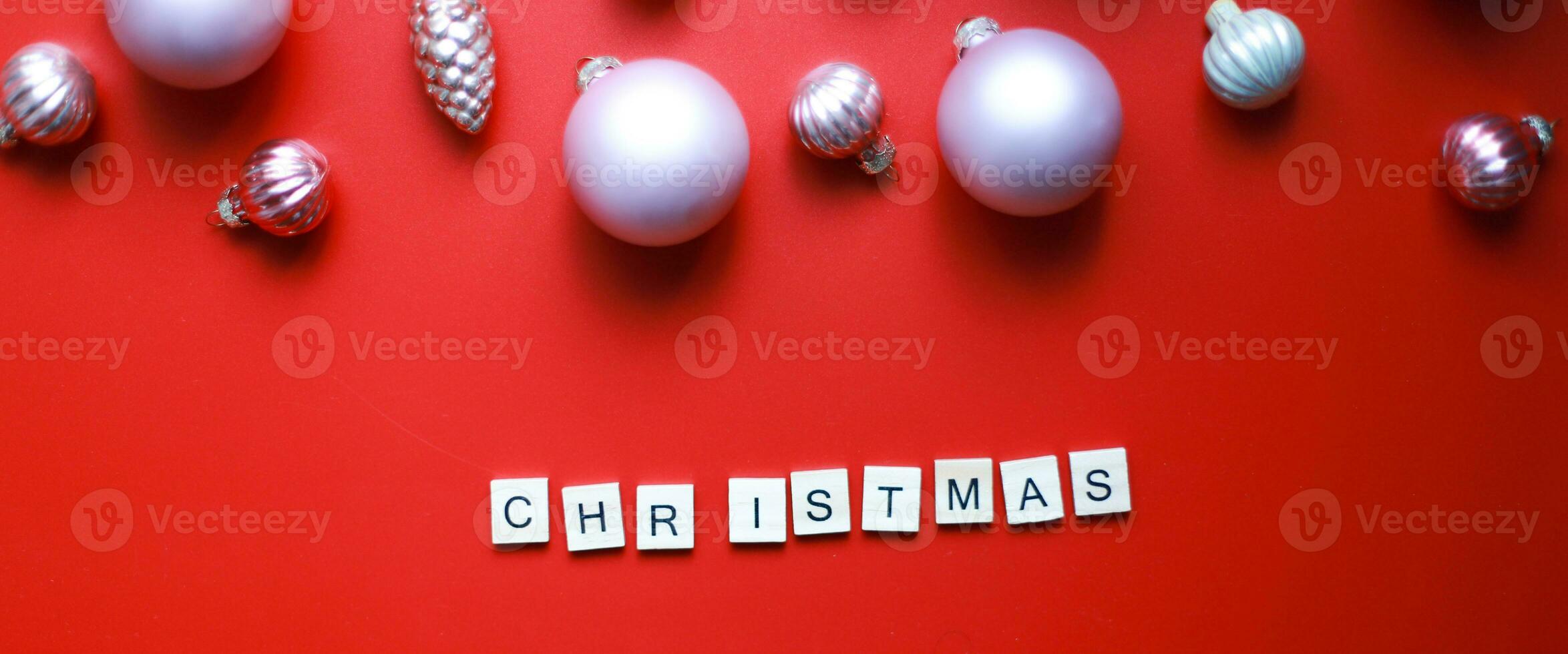 Banner Flat lay word christmas from wooden letters. Flatly Christmas toys for the Christmas tree photo