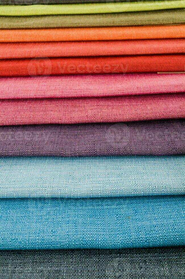 a stack of colorful fabric photo