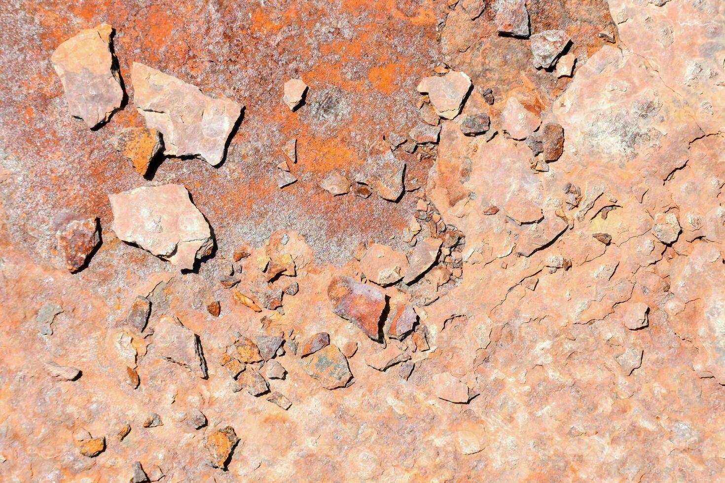 a rusty metal surface with peeling paint photo