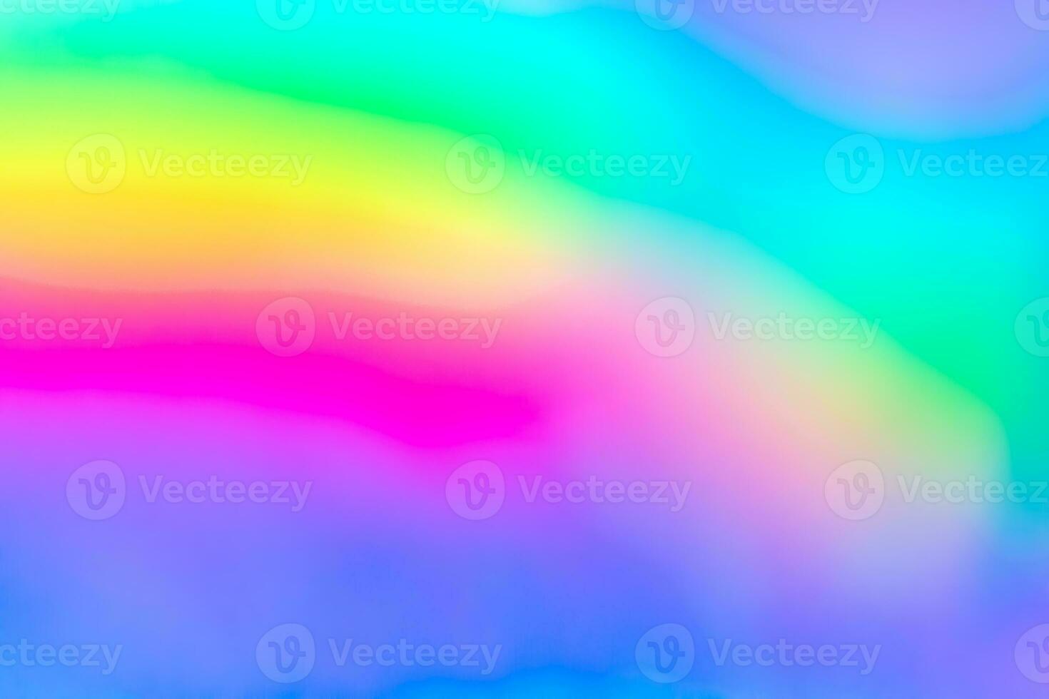 Abstract blur holographic rainbow foil iridescent background photo