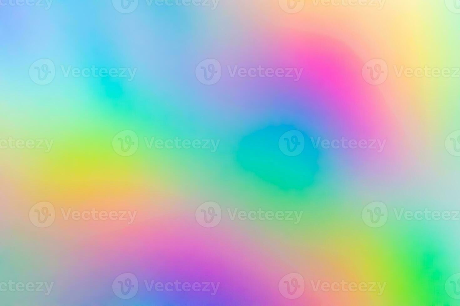 Abstract blur holographic rainbow foil iridescent background photo