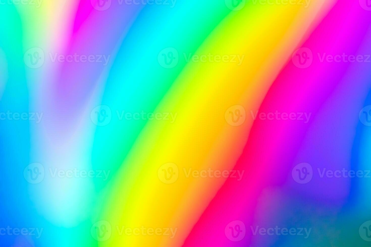 Abstract blur holographic rainbow foil iridescent background photo