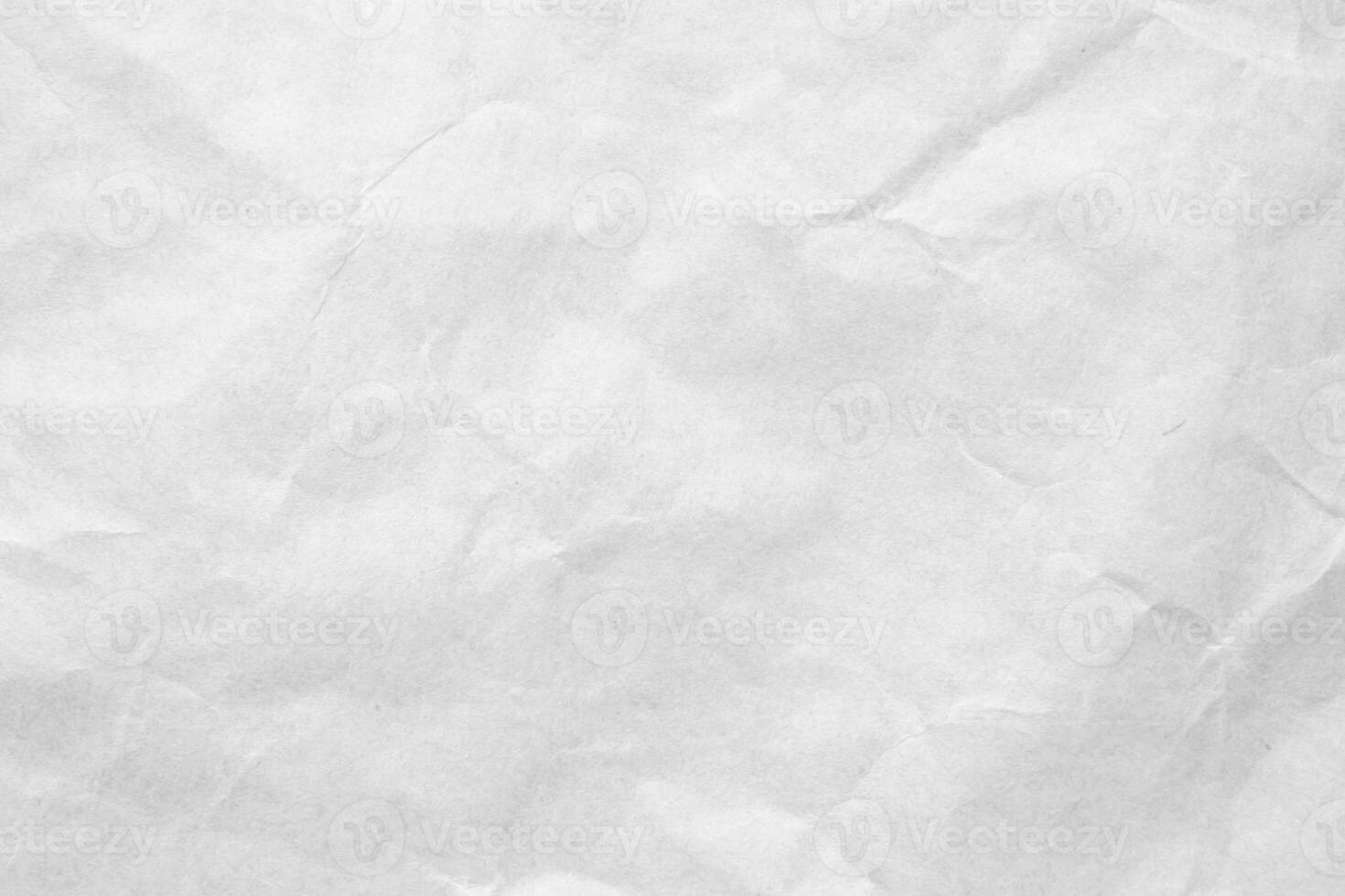 Abstract white crumpled and creased recycle craft paper texture background photo