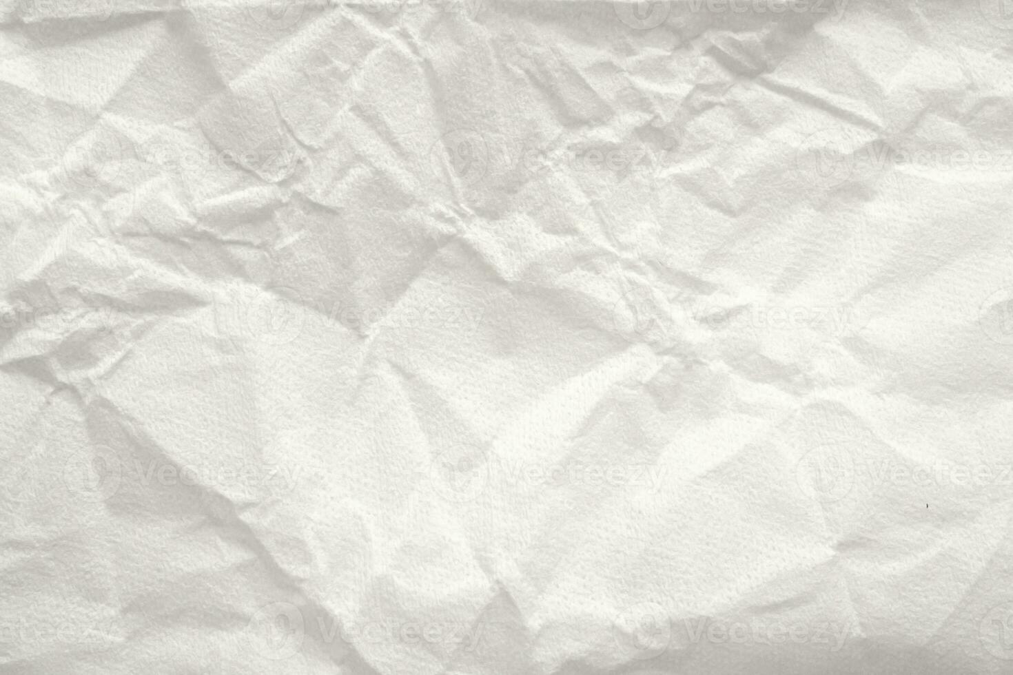 Abstract white crumpled and creased recycle paper texture background photo